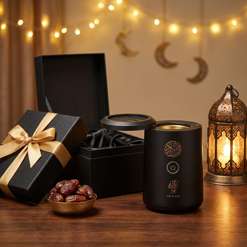 Quran speaker bukhoor burner presented as an Eid gift with dates, lantern and gold ribbon gift box